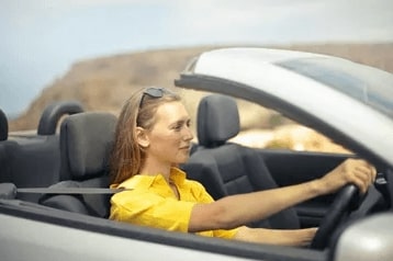 Female Driver in a convertible